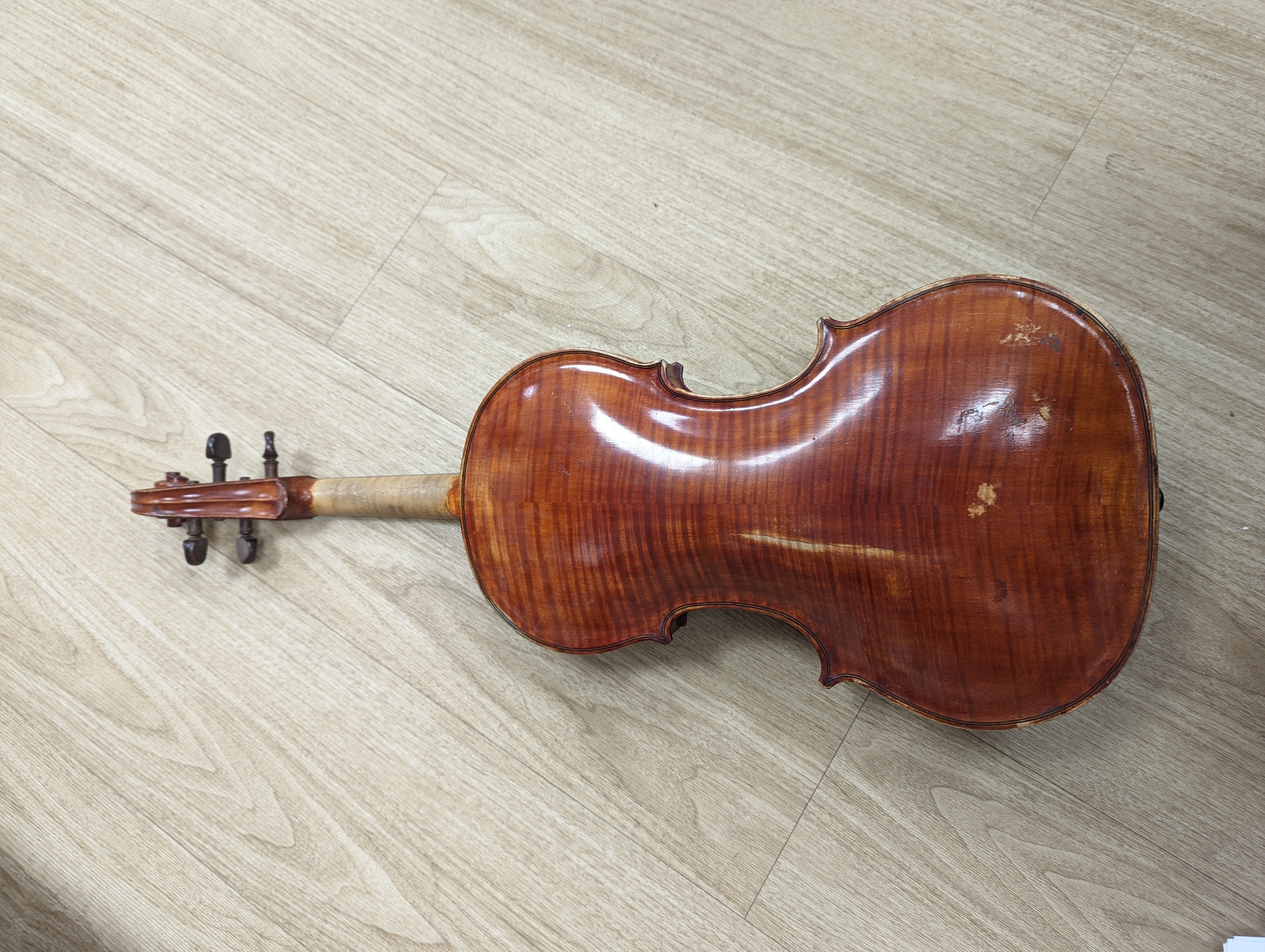 A Viola, assorted bows and a violin back